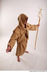 JOEL_ADAMSON STANDING POSE WITH A MAGIC STICK